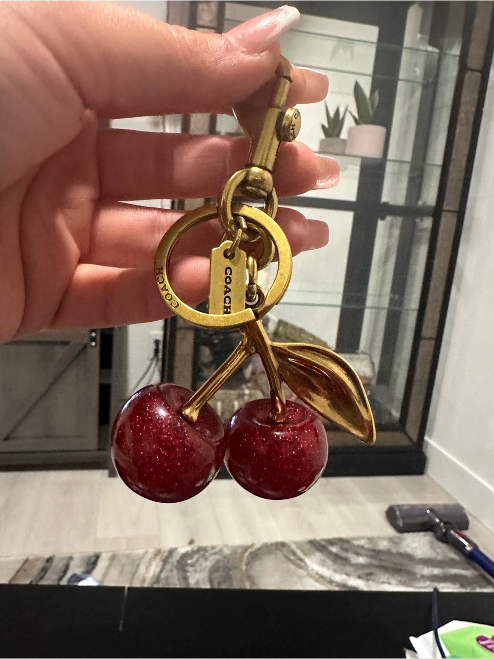 Coach Gold-Tone Cherry Keychain Charm in Shimmering Red